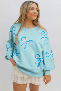 Online Apricot Pink Sequined Bowknot Drop Shoulder Oversized Sweatshirt