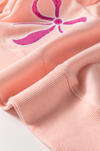 Online Apricot Pink Sequined Bowknot Drop Shoulder Oversized Sweatshirt