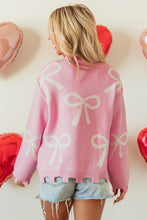 Load image into Gallery viewer, Online Pearl Beaded Bowknot Pattern Distressed Split Hem Sweater
