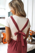 Load image into Gallery viewer, &quot;WAITLIST&quot; Red Clay Knotted Back Strap Cotton Bib Jumpsuit
